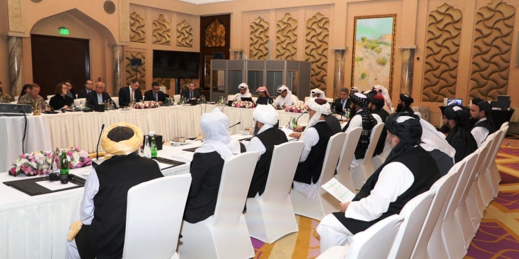 Undated handout picture of U.S., Taliban and Qatar officials during a meeting for peace talks in Doha, Qatar. Qatari Foreign Ministry/Handout via REUTERS ATTENTION EDITORS - THIS PICTURE WAS PROVIDED BY A THIRD PARTY. - RC1623E5FFE0