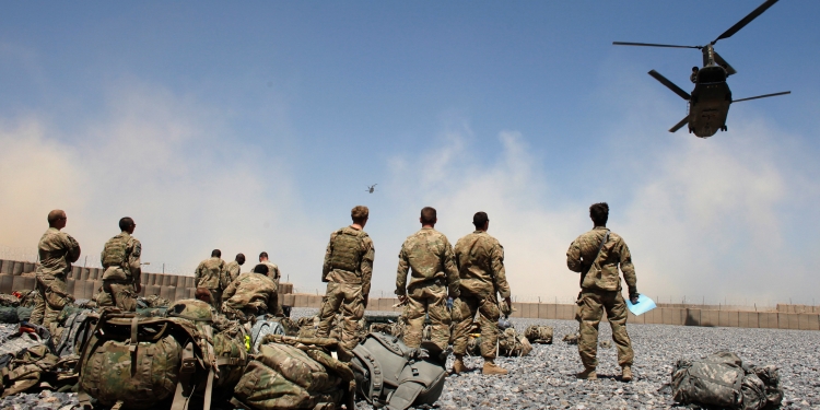 Helicopters carrying U.S. Army soldiers from the 1-320 Field Artillery Regiment, 101st Airborne Division, take off from Combat Outpost Terra Nova as the soldiers head home following a 10-month deployment in the Arghandab Valley north of Kandahar April 23, 2011.  REUTERS/Bob Strong  (AFGHANISTAN - Tags: MILITARY POLITICS IMAGES OF THE DAY)