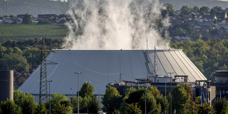 Smoke rises from the nuclear power plant of Nerckarwestheim in Neckarwestheim, Germany, Monday, Aug. 22, 2022. Europe is facing an energy crisis that could lead to rolling blackouts, shuttered factories and a deep recession. Germany is sticking to its long-held plan of shutting down the country's three remaining nuclear power plants this year but keeping the option of reactivating two of them in case of an energy shortage in the coming months. (AP Photo/Michael Probst)