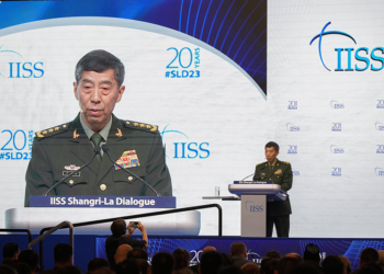 Chinese Defense Minister Gen. Li Shangfu delivers his speech on the last day of the 20th International Institute for Strategic Studies (IISS) Shangri-La Dialogue, Asia's annual defense and security forum, in Singapore, Sunday, June 4, 2023. (AP Photo/Vincent Thian)