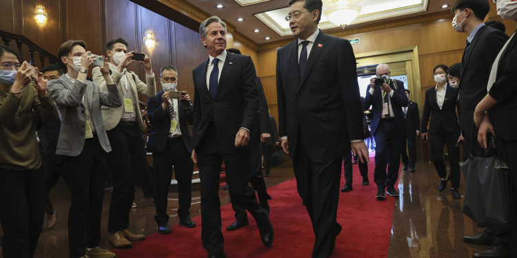 U.S. Secretary of State Antony Blinken, center, left, walks with Chinese Foreign Minister Qin Gang, center right, at the Diaoyutai State Guesthouse in Beijing, China, Sunday, June 18, 2023. (Leah Millis/Pool Photo via AP)