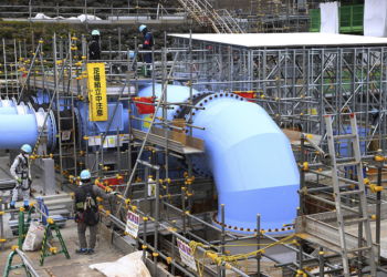 A photo shows pipes to carry treated water under construction at Fukushima Daiichi Nuclear Power Station of TEPCO in Futaba Town, Fukushima Prefecture on May 26, 2023. Fukushima Daiichi Nuclear Power Station suffered major damage from the magnitude 9.0 earthquake and tsunami that hit Japan on March 11, 2011.( The Yomiuri Shimbun via AP Images )