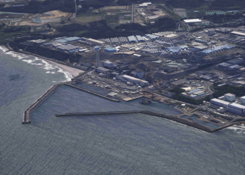 An aerial photo shows the Fukushima No. 1 nuclear power plant of Tokyo Electric Power Company Holdings Inc. in Fukushima Prefecture on Aug. 24, 2023. TEPCO announced that it had started to release treated water stored within the premises of the plant into the ocean on the same day little past 1p.m.. ( The Yomiuri Shimbun via AP Images )