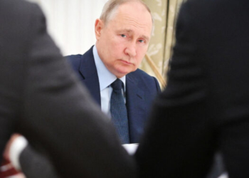 This pool image distributed by Sputnik agency shows Russian President Vladimir Putin chairing a meeting with the heads of Russia's manufacturing enterprises on the development of industry at the Kremlin in Moscow on August 3, 2023. (Photo by Alexander KAZAKOV / POOL / AFP) (Photo by ALEXANDER KAZAKOV/POOL/AFP via Getty Images)