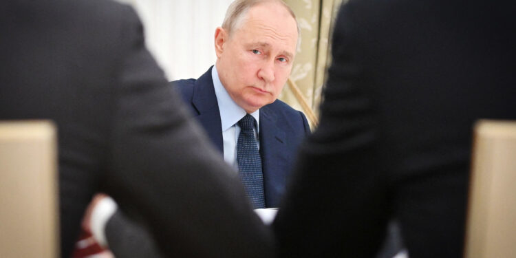 This pool image distributed by Sputnik agency shows Russian President Vladimir Putin chairing a meeting with the heads of Russia's manufacturing enterprises on the development of industry at the Kremlin in Moscow on August 3, 2023. (Photo by Alexander KAZAKOV / POOL / AFP) (Photo by ALEXANDER KAZAKOV/POOL/AFP via Getty Images)