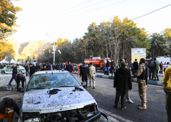 People gather at the site of an explosion in the city of Kerman, about 510 miles (820 kilometres) southeast of the capital Tehran, Iran, Wednesday, Jan. 3, 2024. Two bombs exploded Wednesday at a commemoration for a prominent Iranian general slain by the U.S. in a 2020 drone strike, Iranian officials said, as the Middle East remains on edge over Israel's war on Hamas in the Gaza Strip. (Sare Tajalli, ISNA via AP)