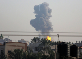 Smoke is rising from the Al-Maghazi Refugee Camp in the central Gaza Strip on January 9, 2024, amid ongoing battles between Israel and Hamas militants. (Photo by Majdi Fathi/NurPhoto)