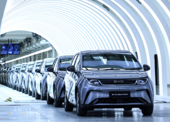 BYD Co. Dolphin compact hatchback electric vehicles at the launch of the company's new plant in Nikhom Phatthana, Rayong province, Thailand, on Thursday, July 4, 2024. BYD's shares have defied heavy losses in EV stocks around the world to gain more than 6% in Hong Kong this year thanks to the introduction of the fifth generation of its plug-in hybrid drive system in May. Photographer: Valeria Mongelli/Bloomberg