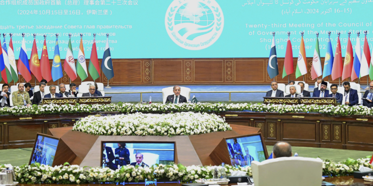 In this photo released by the Press Information Department, Pakistan's Prime Minister Shehbaz Sharif, center, delivers his speech at the opening session of Shanghai Cooperation Organization (SCO) meeting, in Islamabad, Pakistan, Wednesday, Oct. 16, 2024. (Press Information Department via AP)