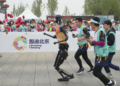 Robots participating in the Beijing Robot Half Marathon, running the same course as humans in Beijing, China on April 19, 2025.( The Yomiuri Shimbun via AP Images )