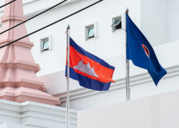 CAMBODIAN EMBASSY, BANGKOK, THAILAND - 2025/07/25: A Cambodian national flag seen at the Cambodian Embassy in Bangkok. Thailand has decided to downgrade diplomatic relations with Cambodia after a fresh landmine incident injured five Thai soldiers on the disputed Thai-Cambodian border in Ubon Ratchathani Province in the northeastern of Thailand on 23 July 2025 and the clashed between Thailand and Cambodian troops still continued since July 24,2025. (Photo by Peerapon Boonyakiat/SOPA Images/LightRocket via Getty Images)
