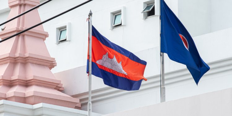 CAMBODIAN EMBASSY, BANGKOK, THAILAND - 2025/07/25: A Cambodian national flag seen at the Cambodian Embassy in Bangkok. Thailand has decided to downgrade diplomatic relations with Cambodia after a fresh landmine incident injured five Thai soldiers on the disputed Thai-Cambodian border in Ubon Ratchathani Province in the northeastern of Thailand on 23 July 2025 and the clashed between Thailand and Cambodian troops still continued since July 24,2025. (Photo by Peerapon Boonyakiat/SOPA Images/LightRocket via Getty Images)