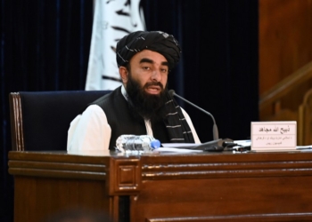 Taliban spokesman Zabihullah Mujahid addresses a press conference in Kabul on September 7, 2021. - The Taliban on September 7 announced UN-sanctioned Taliban veteran Mullah Mohammad Hassan Akhund as the leader of their new government, while giving key positions to some of the movement's top officials. (Photo by Aamir QURESHI / AFP)