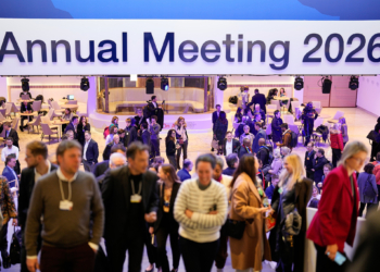 People leave on the final day of the Annual Meeting of the World Economic Forum, Switzerland, Friday, Jan. 23, 2026. (AP Photo/Markus Schreiber)