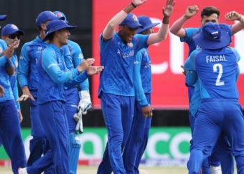 WINDHOEK, NAMIBIA - JANUARY 16: Afghanistan players celebrate the wicket of Jorich van Schalkwyk of South Africa (Not Pictured) during the ICC U19 Men's Cricket World Cup 2026 match between Afghanistan and South Africa at HP Oval on January 16, 2026 in Windhoek, Namibia. (Photo by Floris van Schouwenburg-ICC/ICC via Getty Images)