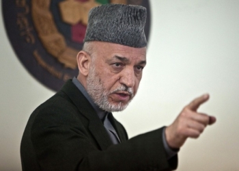Afghan President Hamid Karzai speaks at Afghanistan's Independent Election Commission (IEC) in Kabul April 1, 2010. REUTERS/Ahmad Masood (AFGHANISTAN - Tags: POLITICS)