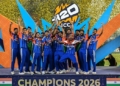 TOPSHOT - India's players celebrate with the trophy after winning the 2026 ICC Men's T20 Cricket World Cup final match against New Zealand at the Narendra Modi Stadium in Ahmedabad on March 8, 2026. (Photo by Punit PARANJPE / AFP via Getty Images)