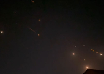 This video grab from AFPTV taken on April 14, 2024 shows explosions lighting up the sky in Hebron in the Israeli-occupied West Bank during an Iranian attack on Israel. Iran's Revolutionary Guards confirmed early April 14, 2024 that a drone and missile attack was under way against Israel in retaliation for a deadly April 1 drone strike on its Damascus consulate. (Photo by AFPTV / AFP)