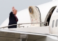 President Donald Trump waves as he departs on Air Force One at Oakland County International Airport, Monday, July 27, 2026, in Waterford Township, Mich. (AP Photo/Alex Brandon)