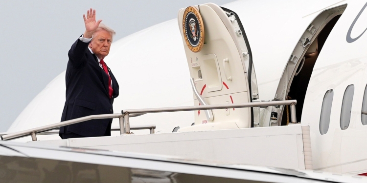 President Donald Trump waves as he departs on Air Force One at Oakland County International Airport, Monday, July 27, 2026, in Waterford Township, Mich. (AP Photo/Alex Brandon)