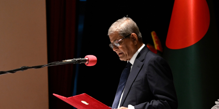 Mirza Fakhrul Islam Alamgir, a veteran of the ruling Bangladesh Nationalist Party, takes the oath of office as president of the country, in Dhaka, Bangladesh, Friday, Aug. 21, 2026. (AP Photo/Mahmud Hossain Opu)