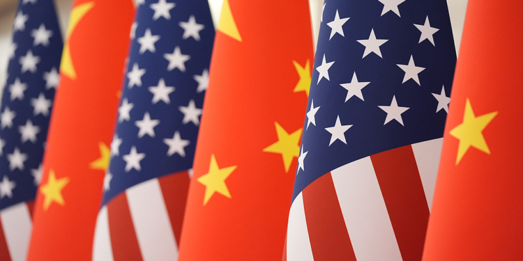 The U.S. and Chinese flag at the Great Hall of the People prior to the state dinner of President Donald Trump and Chinese President Xi Jinping on Thursday May 14, 2026, in Beijing. (AP Photo/Mark Schiefelbein)