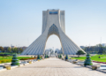 Beautiful view of the Azadi Tower (Freedom Tower) on blue sky background in Tehran, Iran. Azadi Square is a popular tourist attraction of the Middle East.