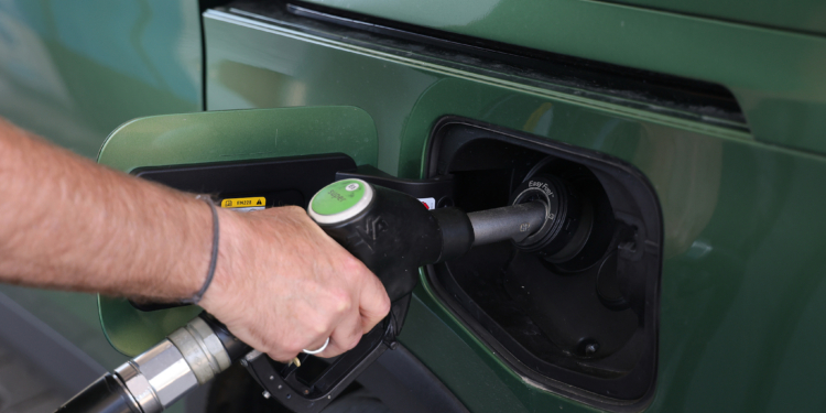 VERONA, ITALY - 2026/09/28: A driver fills up his tank at an ENILive station. Retail fuel prices in Verona surged following broader shifts in European energy markets, pushing petrol and diesel costs up across local service stations. In response to escalating inflation at the pump, major energy suppliers instituted temporary price caps to stabilize consumer rates across the Veneto region. (Photo by Emanuele Pennacchio/SOPA Images/LightRocket via Getty Images)