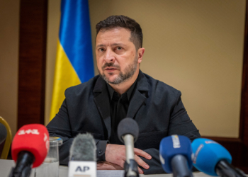 Ukrainian President Volodymyr Zelenskyy speaks to the media after a German-Ukrainian business forum in Kyiv, Ukraine, Sunday, Oct. 4, 2026. (AP Photo/Dan Bashakov)