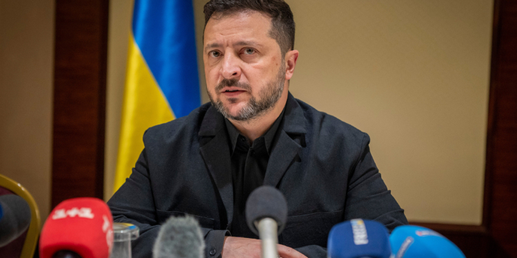 Ukrainian President Volodymyr Zelenskyy speaks to the media after a German-Ukrainian business forum in Kyiv, Ukraine, Sunday, Oct. 4, 2026. (AP Photo/Dan Bashakov)